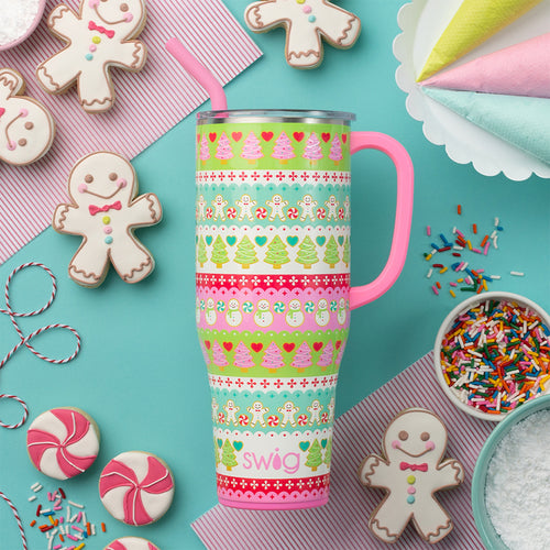 Swig Life 40oz Cookie Jar Insulated Mega Mug surrounded by gingerbread holiday cookies and sprinkles