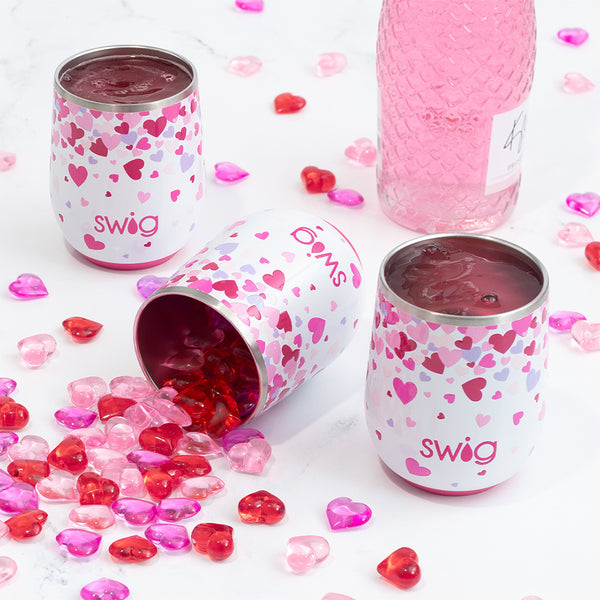 Swig Life 12oz Falling in Love Insulated Stemless Wine Cups with pink and red hearts and champagne