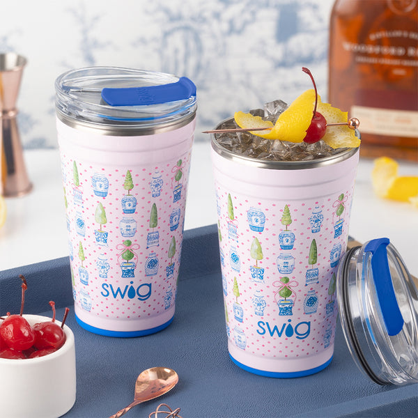 Swig Life 24oz Ginger Jars Insulated Party Cups used as a cocktail vessel with lemon and cherries