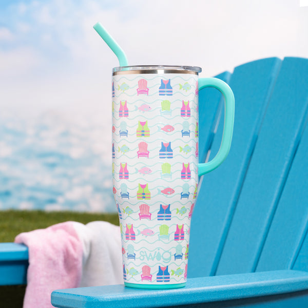 Swig Life 40oz Lake Girl Insulated Mega Mug with Handle on an Adirondack chair