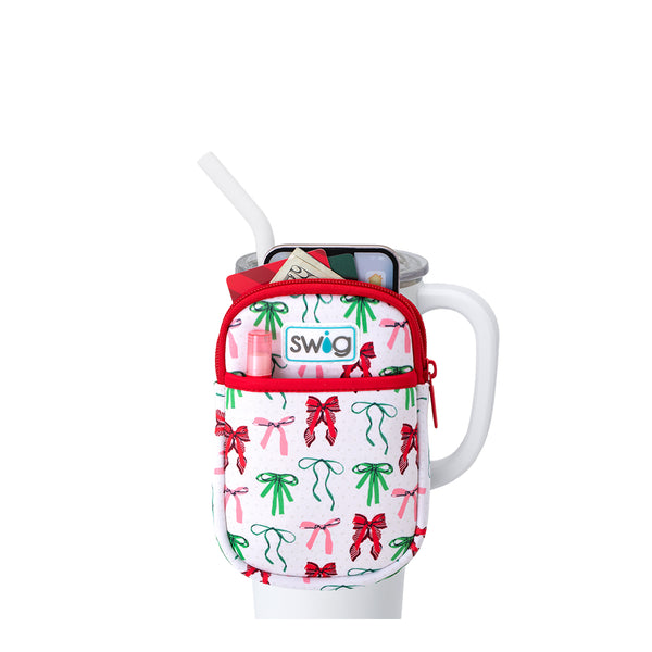 Swig Life Ribbons and Bows Neoprene Mega Mug Pouch with two pockets containing daily essentials