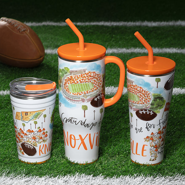 Swig Life Saturdays in Knoxville Drinkware collection in a sports field background