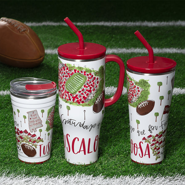 Swig Life Saturdays in Tuscaloosa Drinkware collection in a sports field background