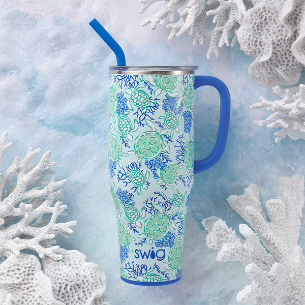 Swig Life Shell Yeah Insulated 40oz Mega Mug on a light blue background surrounded by white coral